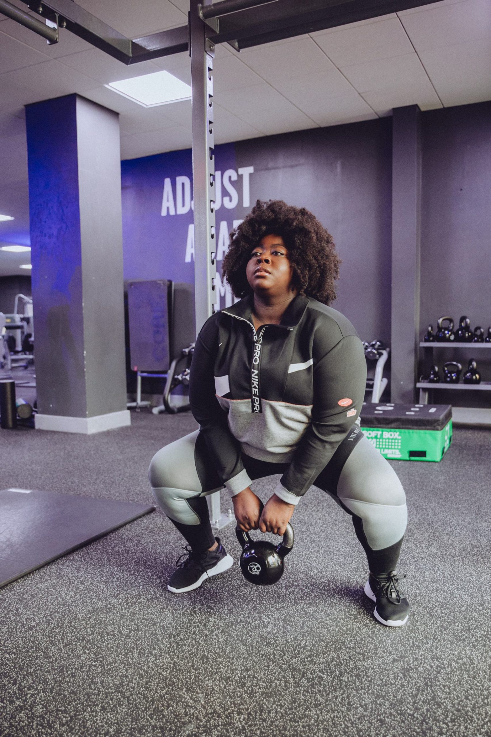 Steph using a kettle bell while working out